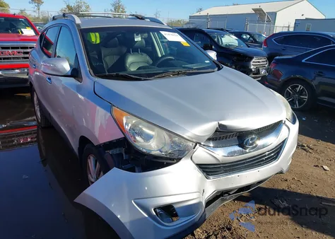 2012 Hyundai Tucson Limited z USA, uszkodzony, nr VIN KM8JUCAC2CU479548